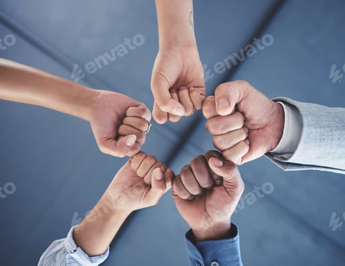 Preview: Team fist bump of business people with teamwork, work support and motivation hand sign. Office grou
