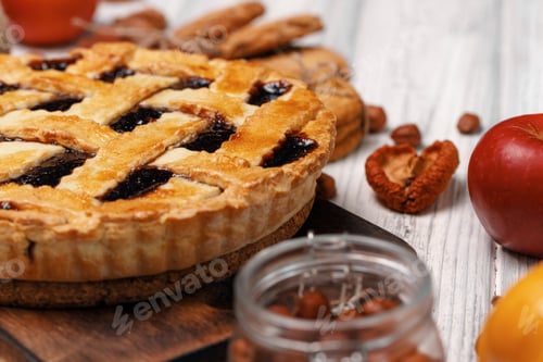 Preview: Berry tart pie on white wooden table