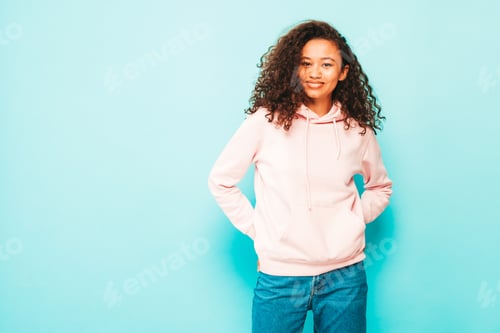 Preview: Young beautiful woman posing in studio