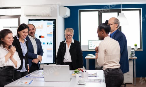Preview: Financial corporate team overjoyed in conference room