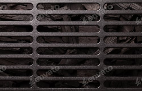 Preview: Metal barbecue grill over hot coal