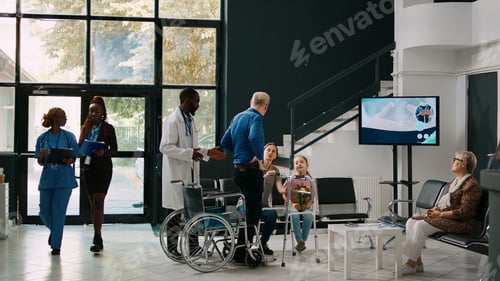 Preview: Senior man in wheelchair trying to walk with walking frame