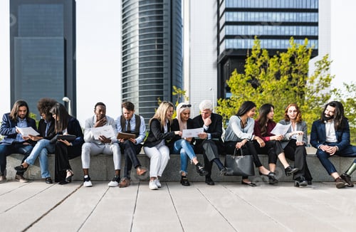 Preview: Panoramic view of business people having a briefing outside the office