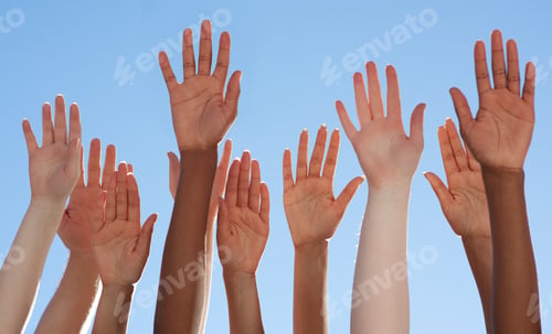 Preview: Solidarity through diversity. Cropped shot of a diverse group of people raising their hands.