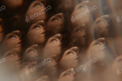 Preview: A kaleidoscopic vision of faces converging in a warm hued closeup