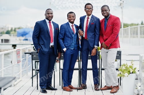 Preview: Group of four african american happy succesfull mans at suit. Rich black business mans.