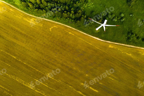 Preview: Windmills on the background of forests and fields. Windmill in nature.Belarus