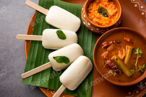 Preview: Idly lollipop or idli candy with stick served with sambar and chutney,South indian breakfast