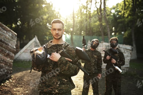 Preview: Paintball team, warriors poses on playground