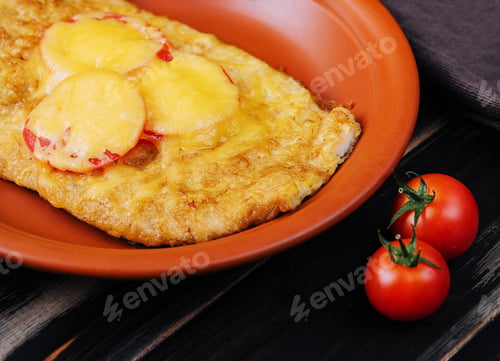 Preview: Chicken fillet baked in the oven with cheese and tomatoes