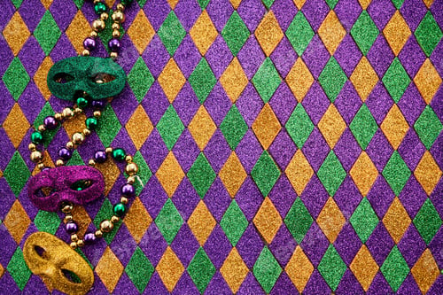 Preview: Mardi Gras background. Colorful Mardi Gras masks and beads