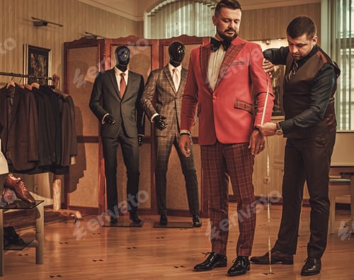 Preview: Fashionable Man Getting a Custom Suit Fitting