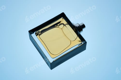 Preview: A bottle of perfume with a spray gun on a blue background with an illuminated texture.