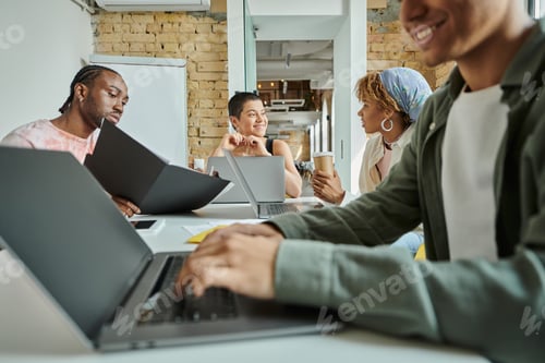 Preview: happy team leader and diverse coworkers, interracial, coworking, startup, man using laptop, gen z