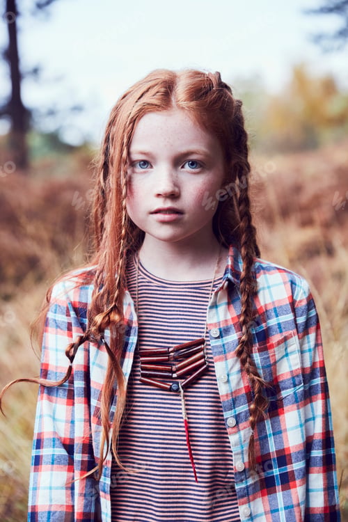 Preview: Portrait of young girl in rural setting