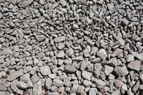 Preview: texture of gray gravel stones on ground for the construction industry
