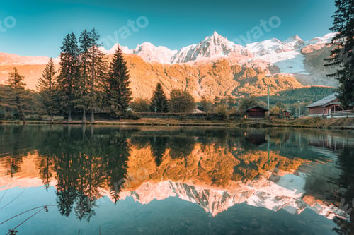 Preview: Scenic view of Mont Blanc massif reflecting in Lac des Gaillands during the sunset at France