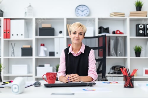 Preview: Portrait of a beautiful young girl in the office.