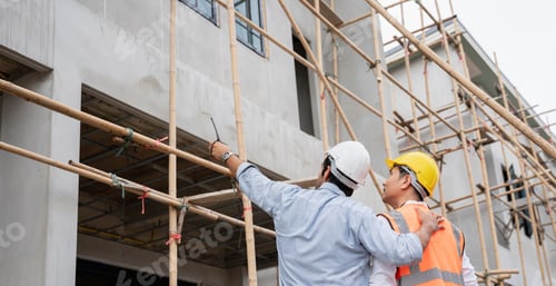 Preview: The engineer manager and foremen discussed the site projects on the construction site.