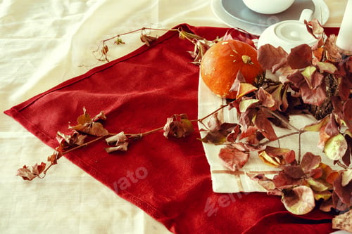 Preview: Stylish thanksgiving autumn table decor with pumpkin and dried branches