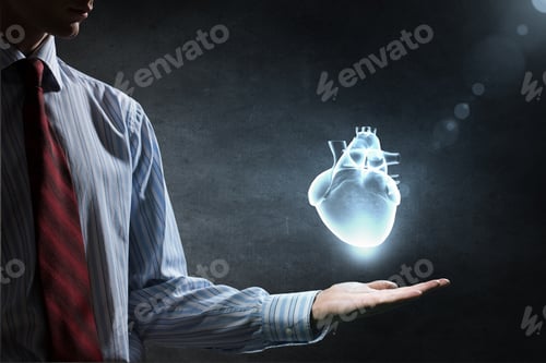 Preview: Close Up Of Man Hand Holding Human Heart