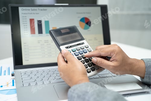 Preview: Asian accountant working and analyzing financial reports project accounting with chart graph