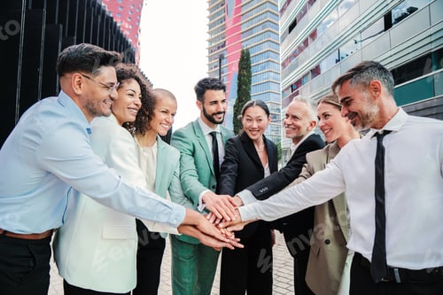 Preview: Group of business people stack hands to celebrate a good deal. Corporate team work cooperation and