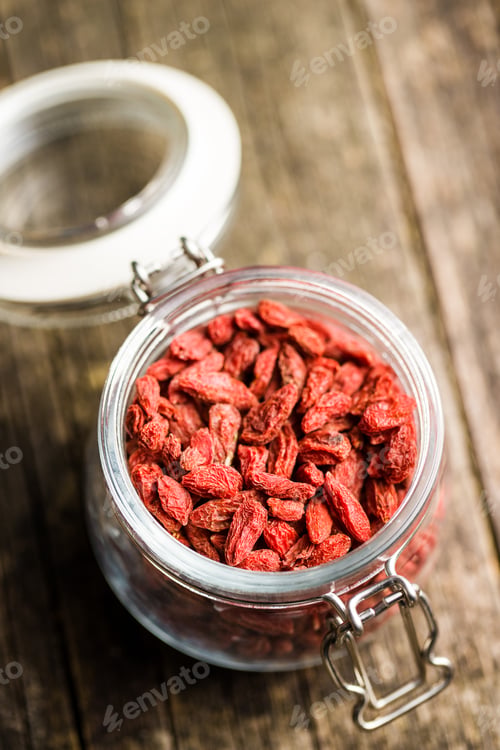 Preview: Jar of Dried Goji Berries on Wooden Table