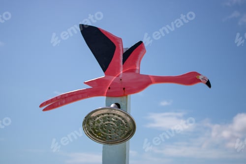 Preview: Pink Flamingo Outdoor Shower On A Clear Blue Sky Day