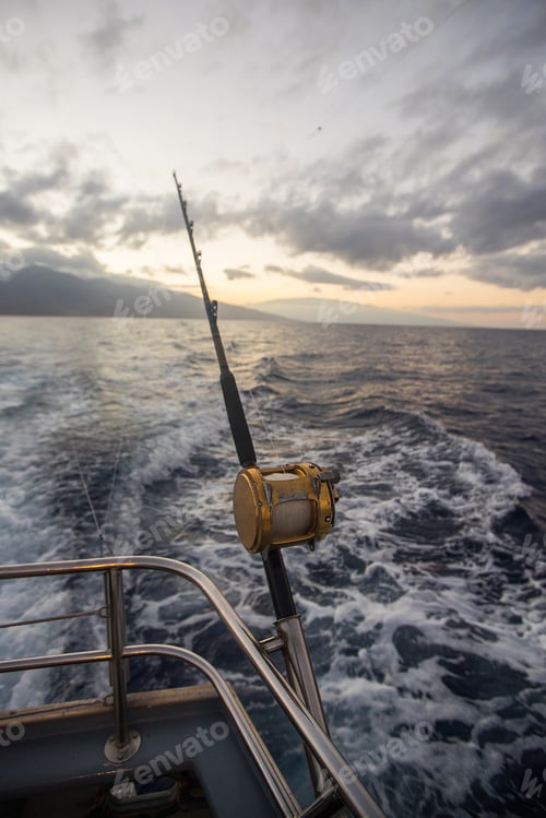 Preview: Deep Sea Fishing Reel on a boat during sunrise