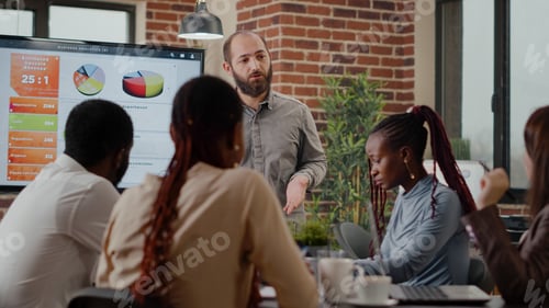 Preview: Business man presenting financial analysis on monitor
