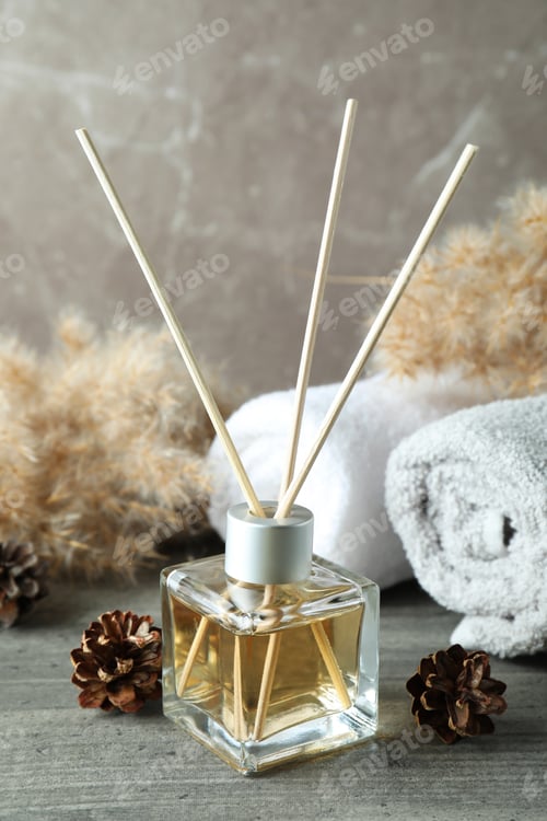 Preview: Diffuser and bath accessories on gray textured table