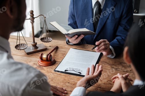 Preview: Businesswoman lawyer talks and explaining agreement business of contract to client in legal office