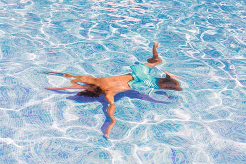 Preview: Boy swimming in pool