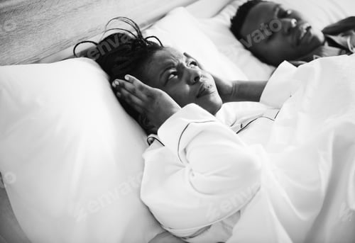 Preview: A couple sleeping while the man is snoring