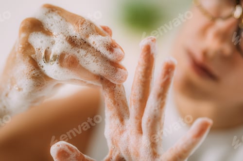 Preview: Obsessive compulsive disorder concept. Woman Obsessively Washing her Hands.