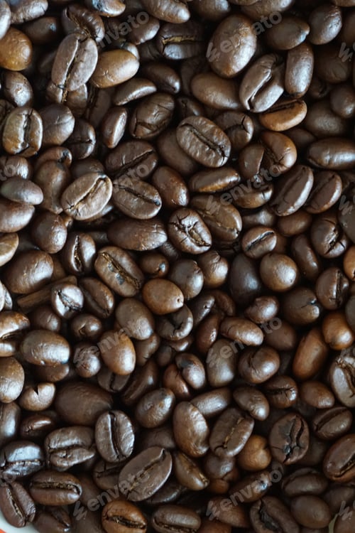 Preview: Vertical closeup shot of coffee beans
