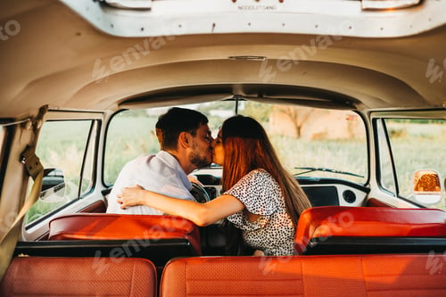 Preview: Couple kissing in van