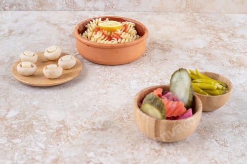 Preview: Delicious pasta with mushrooms on a marble background