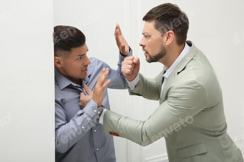 Preview: Emotional colleagues fighting in office. Workplace conflict