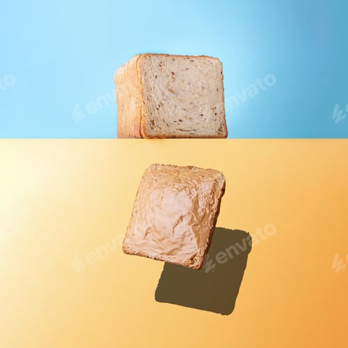 Preview: Creative breakfast concept.Falling peanut butter sandwich with copy space.