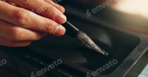 Preview: Hand, closeup of brush in ink for writing and calligraphy or ancient stationery for art and inkston