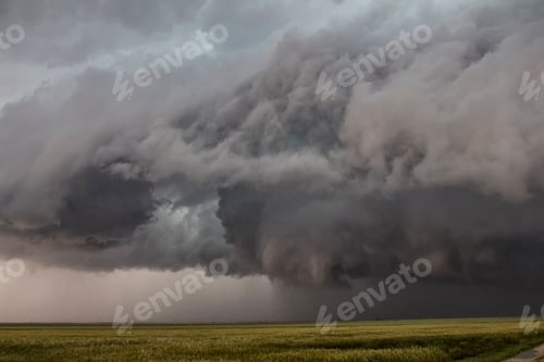 Preview: Dark storm clouds loom over a vast plain.