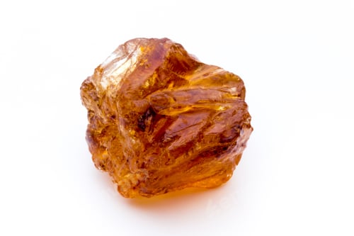 Preview: Brown caramelized sugar on white background.