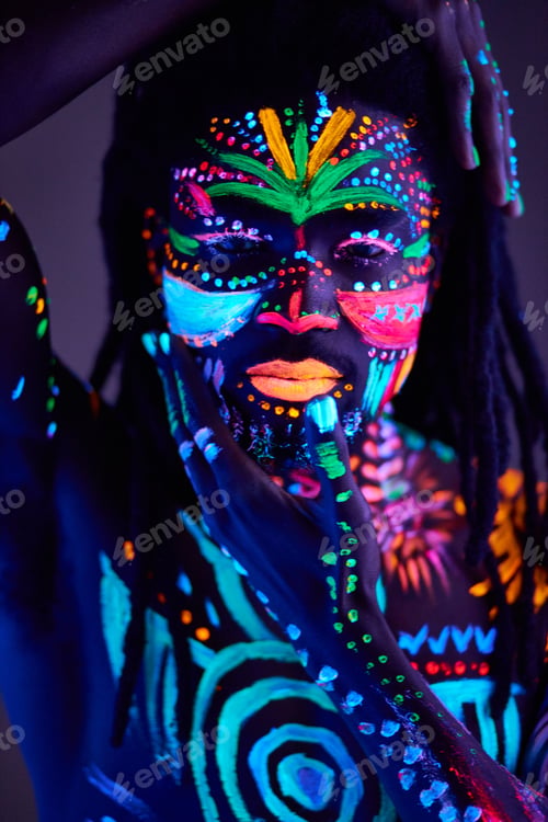 Preview: fantastic guy in UV body art touching face