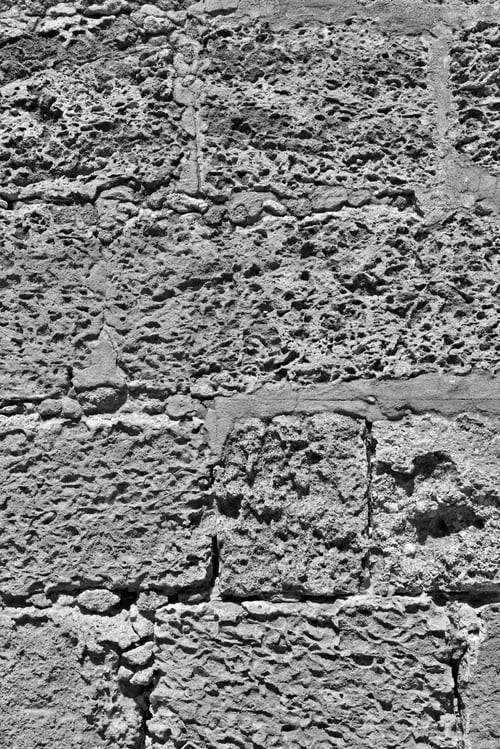 Preview: Rough Porous Texture Of Stone Bricks Of An Old And Ancient Wall Of Monochrome Tone