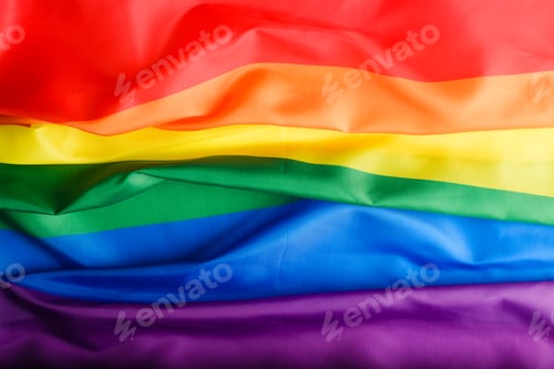 Preview: Top view rainbow flag background, international symbol of LGBT community, sign of diversity and