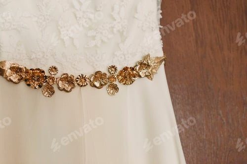 Preview: Detail of the texture of a white wedding dress.