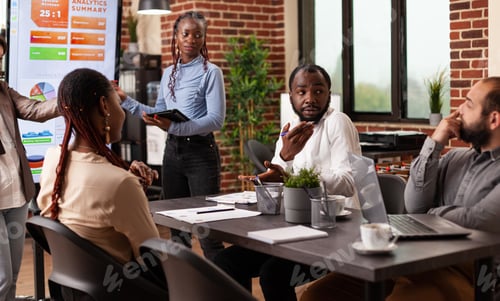 Preview: Businesswoman explaining management strategy showing company graph