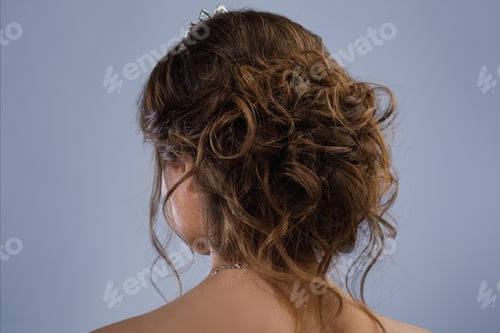 Preview: Elegant Updo Hairstyle with Tiara on Woman
